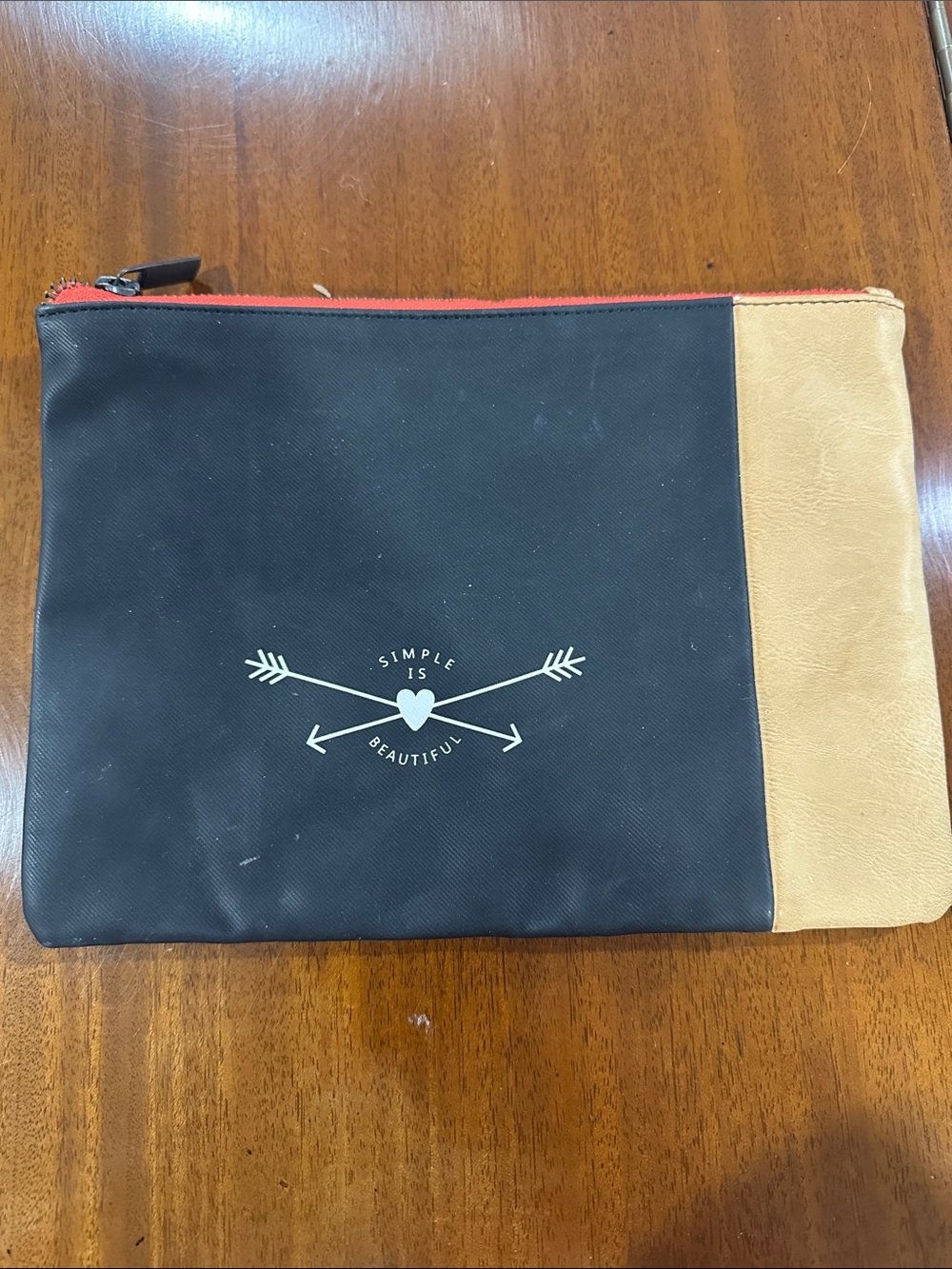 5 for $40: Toms Black and Tan Pouch
